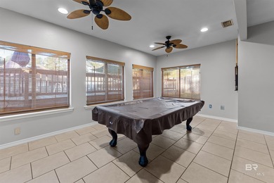 Welcome home to this 3 bedroom, 2 bath brick home with a bonus on Lake Forest Yacht and Country Club in Alabama - for sale on GolfHomes.com, golf home, golf lot