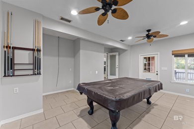 Welcome home to this 3 bedroom, 2 bath brick home with a bonus on Lake Forest Yacht and Country Club in Alabama - for sale on GolfHomes.com, golf home, golf lot