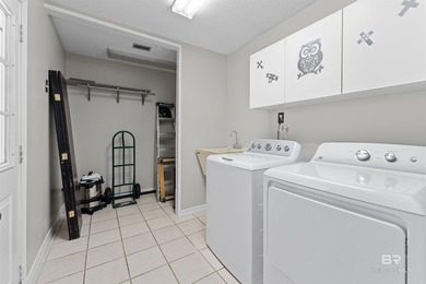 Welcome home to this 3 bedroom, 2 bath brick home with a bonus on Lake Forest Yacht and Country Club in Alabama - for sale on GolfHomes.com, golf home, golf lot