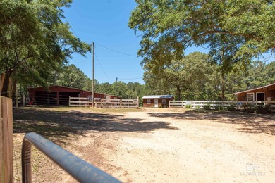Welcome home to this 3 bedroom, 2 bath brick home with a bonus on Lake Forest Yacht and Country Club in Alabama - for sale on GolfHomes.com, golf home, golf lot