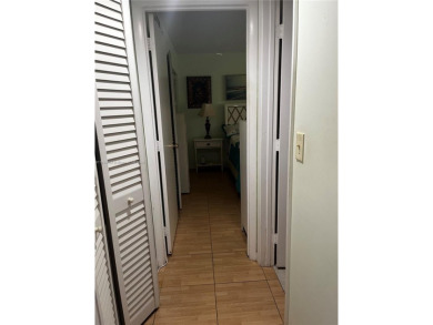 Spacious and beautiful 2-bedroom, 2-bathroom first-floor unit on Oriole Golf and Tennis Club in Florida - for sale on GolfHomes.com, golf home, golf lot