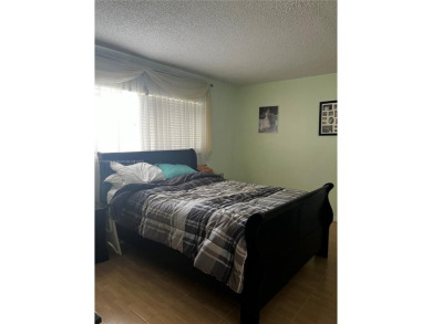 Spacious and beautiful 2-bedroom, 2-bathroom first-floor unit on Oriole Golf and Tennis Club in Florida - for sale on GolfHomes.com, golf home, golf lot