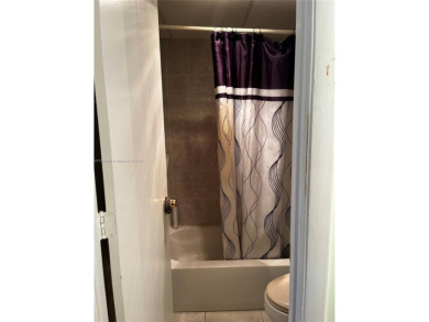 Spacious and beautiful 2-bedroom, 2-bathroom first-floor unit on Oriole Golf and Tennis Club in Florida - for sale on GolfHomes.com, golf home, golf lot