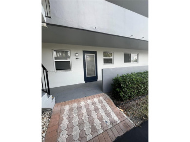 Spacious and beautiful 2-bedroom, 2-bathroom first-floor unit on Oriole Golf and Tennis Club in Florida - for sale on GolfHomes.com, golf home, golf lot