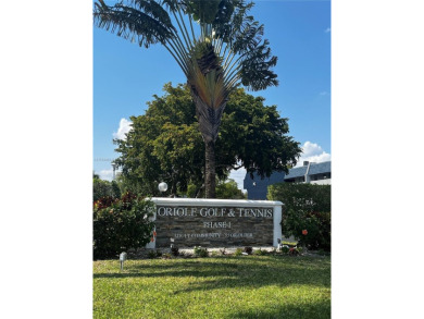Spacious and beautiful 2-bedroom, 2-bathroom first-floor unit on Oriole Golf and Tennis Club in Florida - for sale on GolfHomes.com, golf home, golf lot