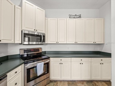 Located in Glen Lakes, this 2003 Addison Audubon maintenance on Glen Lakes Country Club in Florida - for sale on GolfHomes.com, golf home, golf lot