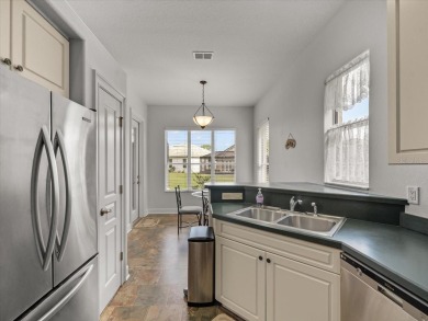 Located in Glen Lakes, this 2003 Addison Audubon maintenance on Glen Lakes Country Club in Florida - for sale on GolfHomes.com, golf home, golf lot