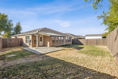 Welcome to 15944 Avenel Way, a charming single-story residence on The Golf Club At Champions Circle in Texas - for sale on GolfHomes.com, golf home, golf lot