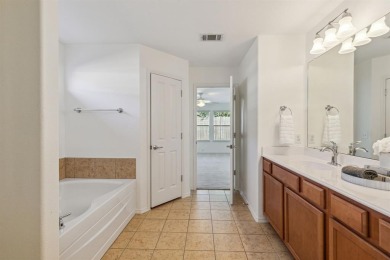 Welcome to 15944 Avenel Way, a charming single-story residence on The Golf Club At Champions Circle in Texas - for sale on GolfHomes.com, golf home, golf lot