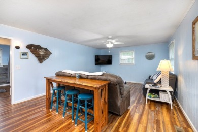 Enjoy boating, fishing & swimming from this recently renovated on Players Course At Wyboo Plantation in South Carolina - for sale on GolfHomes.com, golf home, golf lot