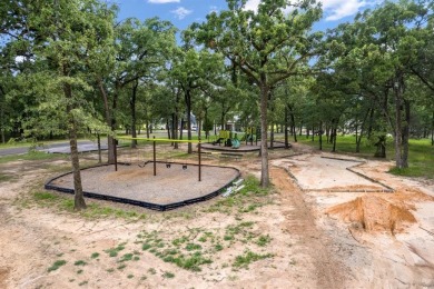 Build your paradise on this beautifully treed, replatted on Pinnacle Golf and Boat Club in Texas - for sale on GolfHomes.com, golf home, golf lot