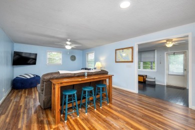 Enjoy boating, fishing & swimming from this recently renovated on Players Course At Wyboo Plantation in South Carolina - for sale on GolfHomes.com, golf home, golf lot