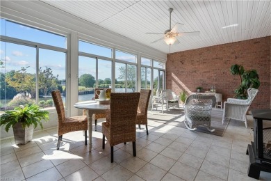 Experience breathtaking sunsets over the 7th hole of Heron Ridge on Heron Ridge Golf Club in Virginia - for sale on GolfHomes.com, golf home, golf lot