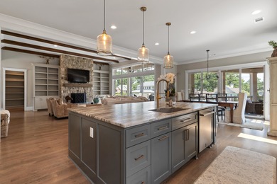 Luxury Lakefront Living. Welcome to 131 Cape View Lane, located on The Golf Club at Cuscowilla in Georgia - for sale on GolfHomes.com, golf home, golf lot