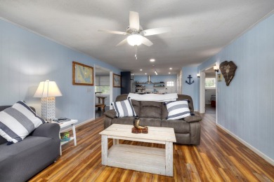 Enjoy boating, fishing & swimming from this recently renovated on Players Course At Wyboo Plantation in South Carolina - for sale on GolfHomes.com, golf home, golf lot