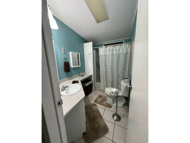Welcome to this charming and meticulously maintained 2-bedroom on Schalamar Creek Golf and Country Club in Florida - for sale on GolfHomes.com, golf home, golf lot