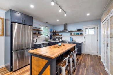 Enjoy boating, fishing & swimming from this recently renovated on Players Course At Wyboo Plantation in South Carolina - for sale on GolfHomes.com, golf home, golf lot