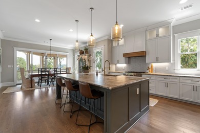 Luxury Lakefront Living. Welcome to 131 Cape View Lane, located on The Golf Club at Cuscowilla in Georgia - for sale on GolfHomes.com, golf home, golf lot