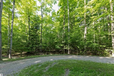 Tucked into the heart of Leelanau County, this beautifully treed on Manitou Passage Golf Club in Michigan - for sale on GolfHomes.com, golf home, golf lot