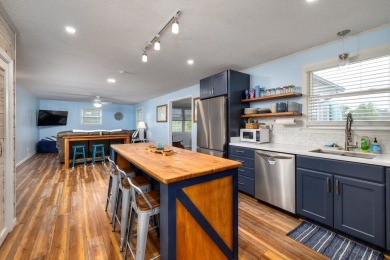 Enjoy boating, fishing & swimming from this recently renovated on Players Course At Wyboo Plantation in South Carolina - for sale on GolfHomes.com, golf home, golf lot