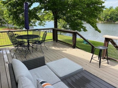 Enjoy boating, fishing & swimming from this recently renovated on Players Course At Wyboo Plantation in South Carolina - for sale on GolfHomes.com, golf home, golf lot