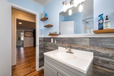 Enjoy boating, fishing & swimming from this recently renovated on Players Course At Wyboo Plantation in South Carolina - for sale on GolfHomes.com, golf home, golf lot
