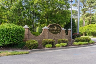 Experience breathtaking sunsets over the 7th hole of Heron Ridge on Heron Ridge Golf Club in Virginia - for sale on GolfHomes.com, golf home, golf lot