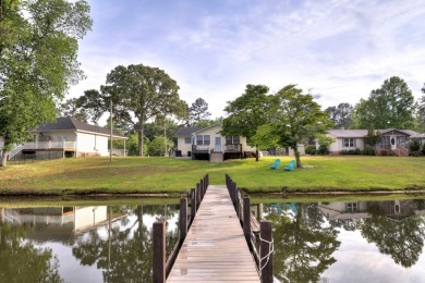 Enjoy boating, fishing & swimming from this recently renovated on Players Course At Wyboo Plantation in South Carolina - for sale on GolfHomes.com, golf home, golf lot