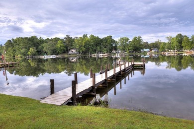 Enjoy boating, fishing & swimming from this recently renovated on Players Course At Wyboo Plantation in South Carolina - for sale on GolfHomes.com, golf home, golf lot