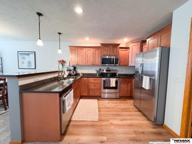 This home is sure to impress! Welcome to this 4-bedroom, 3 on Mahoney Golf Course in Nebraska - for sale on GolfHomes.com, golf home, golf lot