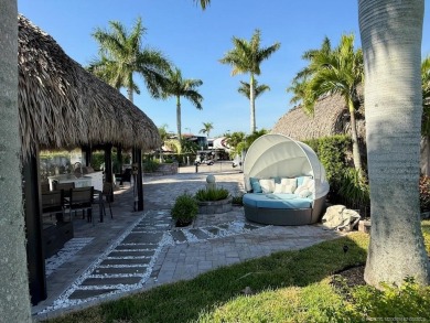 Welcome to this enchanting waterfront & golf-front tiki Lot! on Motorcoach Resort Golf Course in Florida - for sale on GolfHomes.com, golf home, golf lot