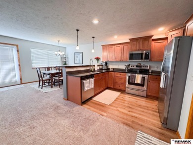 This home is sure to impress! Welcome to this 4-bedroom, 3 on Mahoney Golf Course in Nebraska - for sale on GolfHomes.com, golf home, golf lot