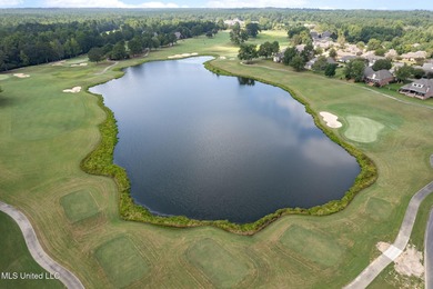 This golf course frontage lot in Canebrake is surrounded by on Canebrake Country Club in Mississippi - for sale on GolfHomes.com, golf home, golf lot