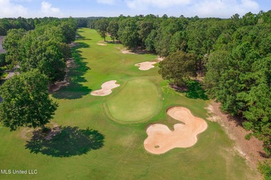 This golf course frontage lot in Canebrake is surrounded by on Canebrake Country Club in Mississippi - for sale on GolfHomes.com, golf home, golf lot