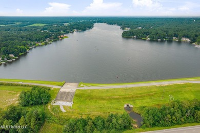 This golf course frontage lot in Canebrake is surrounded by on Canebrake Country Club in Mississippi - for sale on GolfHomes.com, golf home, golf lot