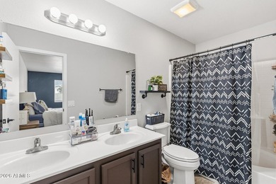 Enjoy easy living in a beautiful golf course community with this on The Golf Club At Johnson Ranch in Arizona - for sale on GolfHomes.com, golf home, golf lot