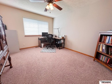 This home is sure to impress! Welcome to this 4-bedroom, 3 on Mahoney Golf Course in Nebraska - for sale on GolfHomes.com, golf home, golf lot