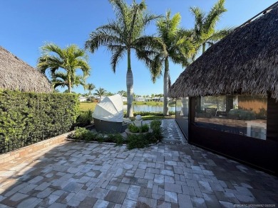 Welcome to this enchanting waterfront & golf-front tiki Lot! on Motorcoach Resort Golf Course in Florida - for sale on GolfHomes.com, golf home, golf lot