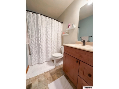 This home is sure to impress! Welcome to this 4-bedroom, 3 on Mahoney Golf Course in Nebraska - for sale on GolfHomes.com, golf home, golf lot