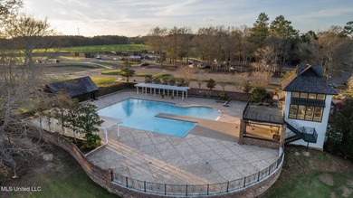 This golf course frontage lot in Canebrake is surrounded by on Canebrake Country Club in Mississippi - for sale on GolfHomes.com, golf home, golf lot