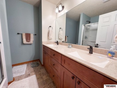 This home is sure to impress! Welcome to this 4-bedroom, 3 on Mahoney Golf Course in Nebraska - for sale on GolfHomes.com, golf home, golf lot