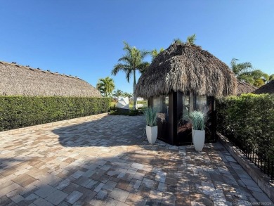 Welcome to this enchanting waterfront & golf-front tiki Lot! on Motorcoach Resort Golf Course in Florida - for sale on GolfHomes.com, golf home, golf lot