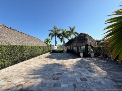 Welcome to this enchanting waterfront & golf-front tiki Lot! on Motorcoach Resort Golf Course in Florida - for sale on GolfHomes.com, golf home, golf lot