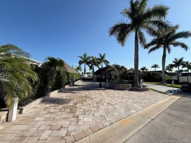 Welcome to this enchanting waterfront & golf-front tiki Lot! on Motorcoach Resort Golf Course in Florida - for sale on GolfHomes.com, golf home, golf lot