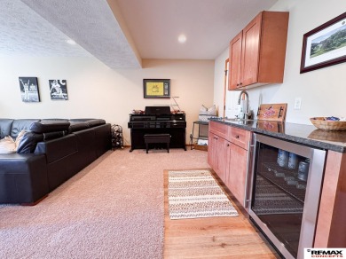 This home is sure to impress! Welcome to this 4-bedroom, 3 on Mahoney Golf Course in Nebraska - for sale on GolfHomes.com, golf home, golf lot