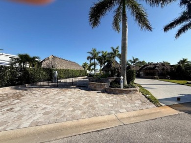 Welcome to this enchanting waterfront & golf-front tiki Lot! on Motorcoach Resort Golf Course in Florida - for sale on GolfHomes.com, golf home, golf lot