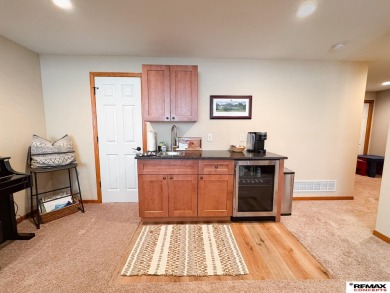 This home is sure to impress! Welcome to this 4-bedroom, 3 on Mahoney Golf Course in Nebraska - for sale on GolfHomes.com, golf home, golf lot