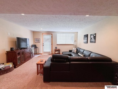 This home is sure to impress! Welcome to this 4-bedroom, 3 on Mahoney Golf Course in Nebraska - for sale on GolfHomes.com, golf home, golf lot