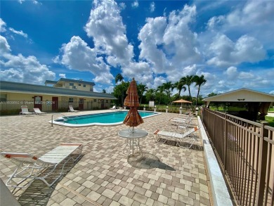 Discover the charm of a beautifully remodeled 55+ community! on Lauderhill Golf Course in Florida - for sale on GolfHomes.com, golf home, golf lot