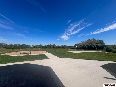 This home is sure to impress! Welcome to this 4-bedroom, 3 on Mahoney Golf Course in Nebraska - for sale on GolfHomes.com, golf home, golf lot